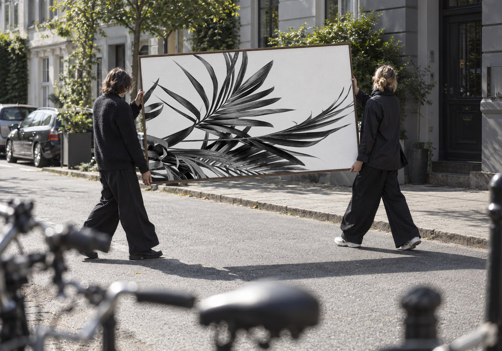 Palm Leaves Black and White 01 - Framed canvas in an interior