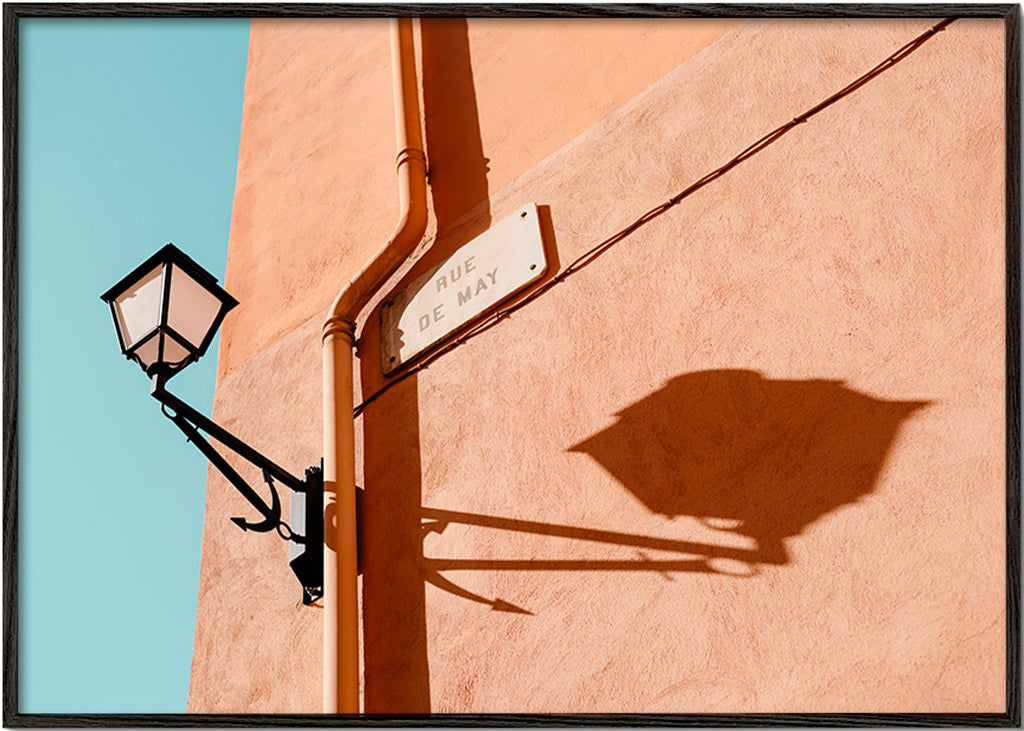 Travel poster with Rue de May lamp and shadow – Black Frame