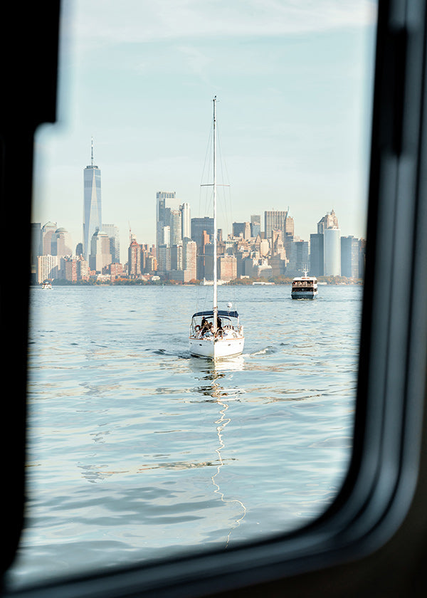 Travel poster with sailboat and skyline