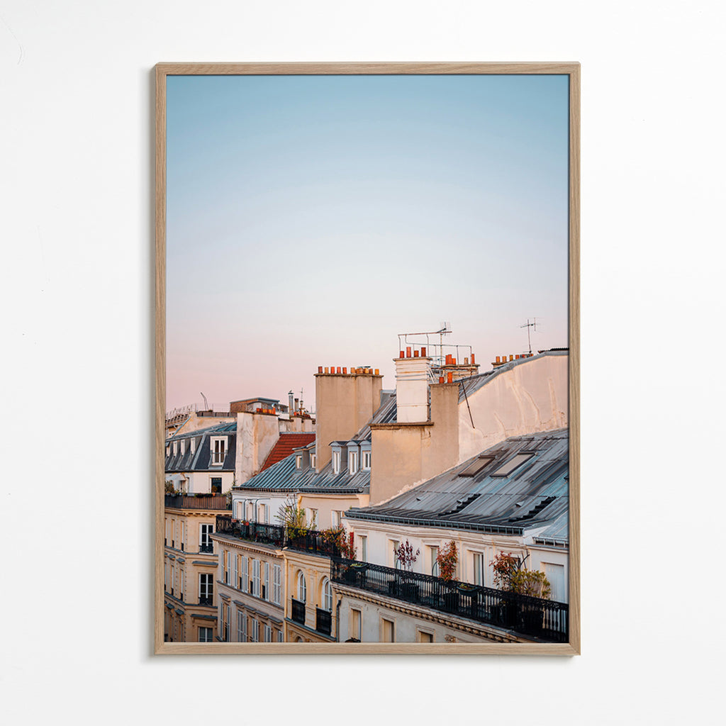 Travel poster of urban rooftops at sunrise – Oak Frame