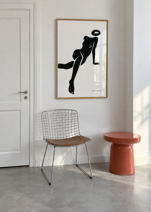 Black figure #1 - Framed poster in an interior