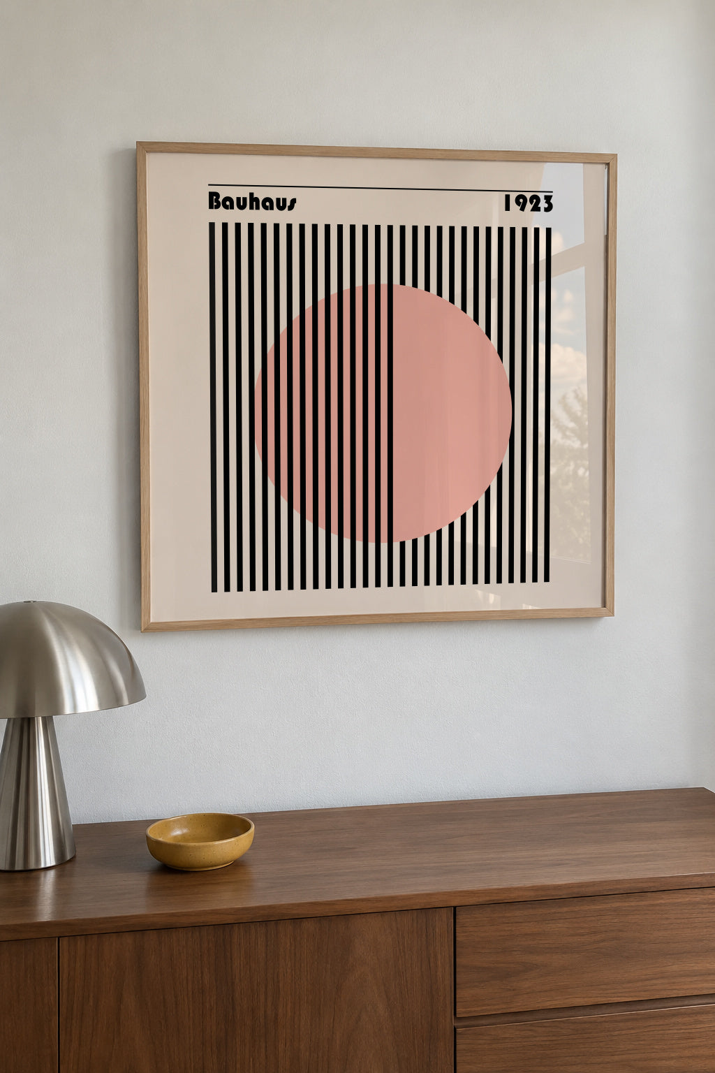 Bauhaus Pink Circle II - Framed poster in an interior