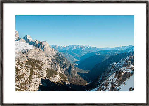 Landscape photo of snowy mountain valley