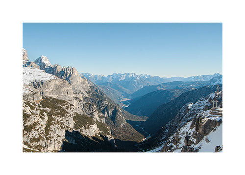 Landscape photo of snowy mountain valley